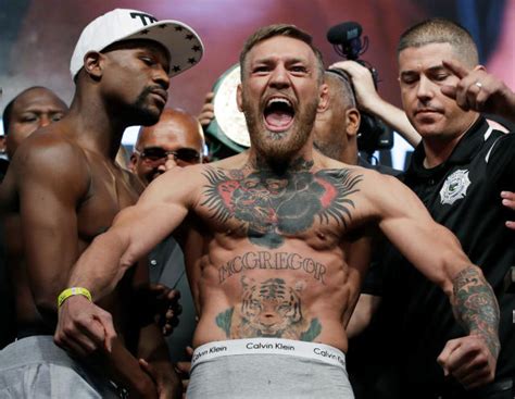 McGregor's Mascot Mishap: MMA Fighter Lands Controversial Punch